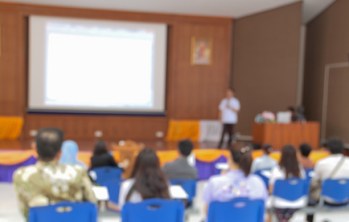 blurred  Business Conference and Presentation. Audience in the conference hall. Business and Entrepreneurship.